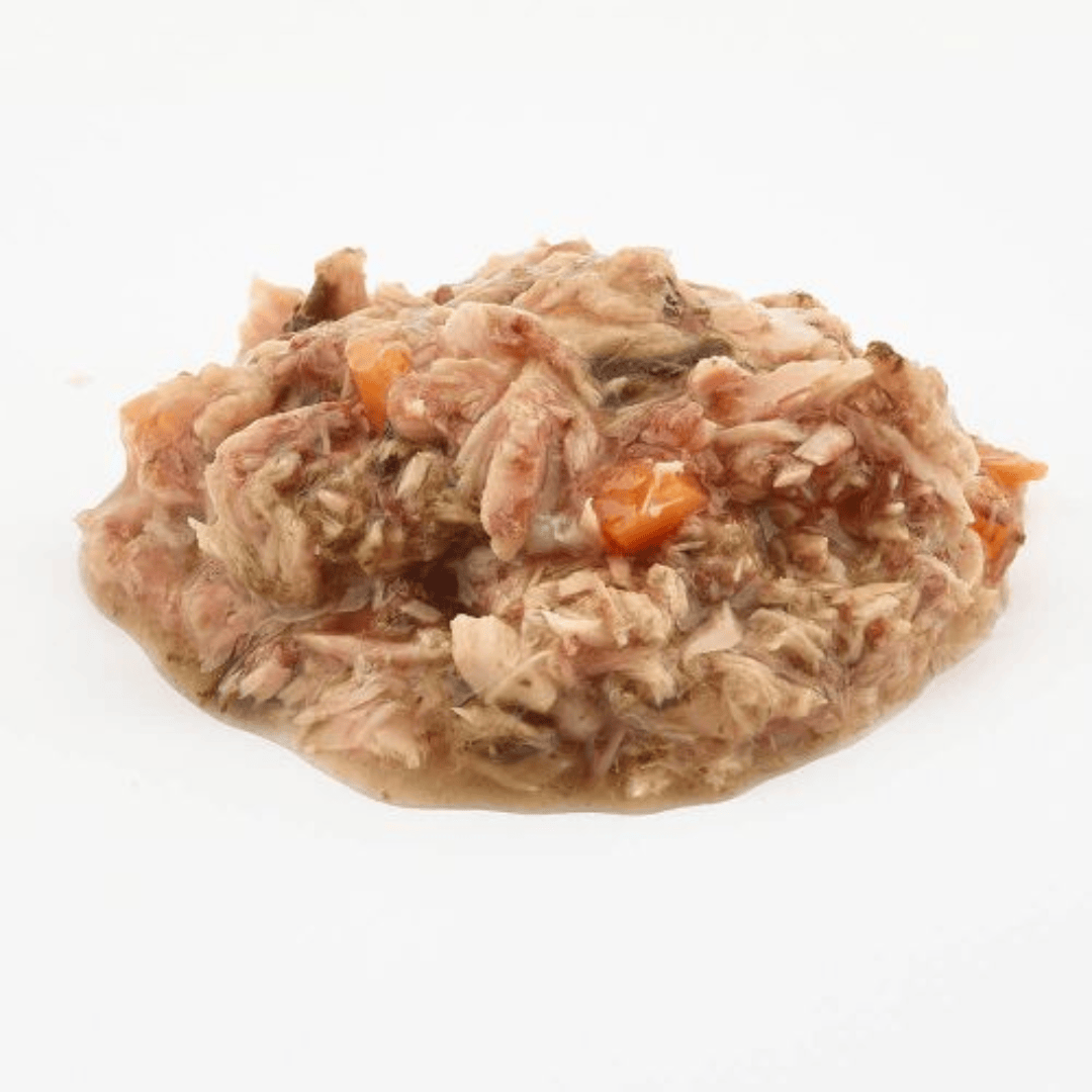 Fish 4 Dogs Finest Tuna with Spinach and Carrot on a white background.