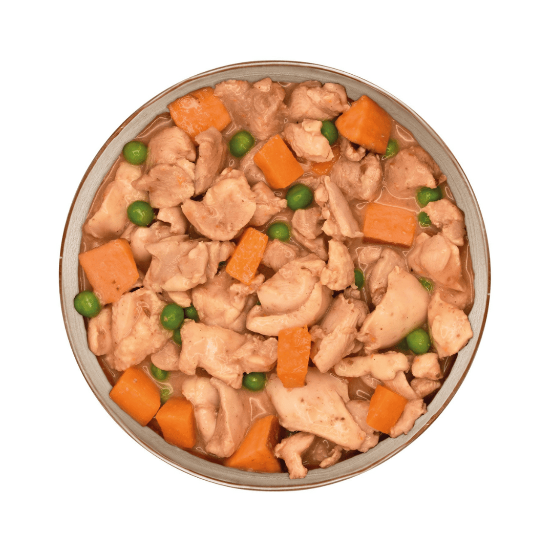 Arquivet Chicken Stew with chicken, carrots, and peas in a bowl on a white background
