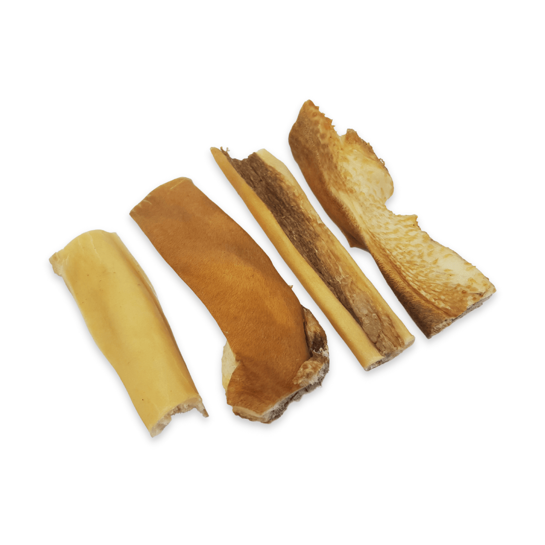 pieces of beef chews on a white background