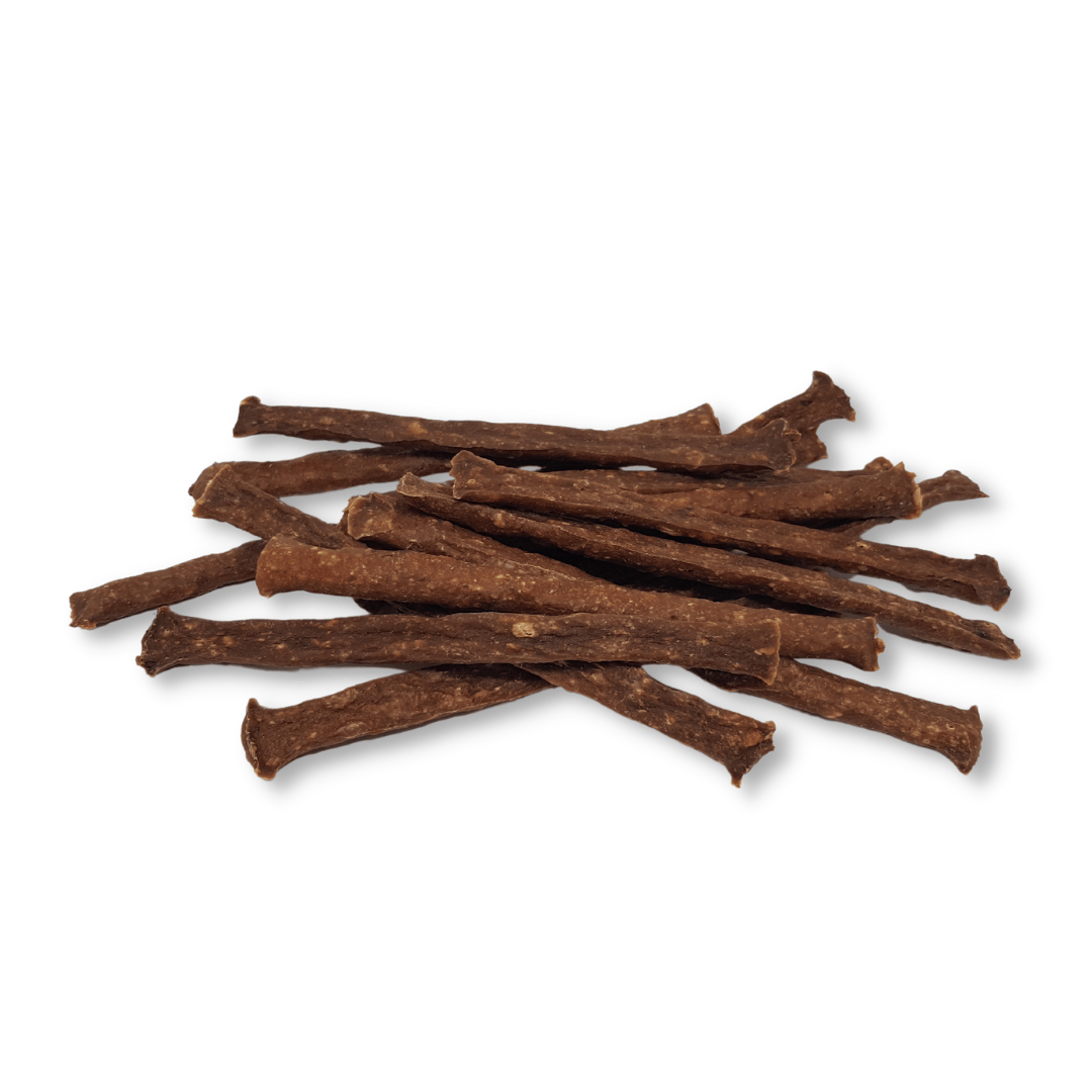 A group of lamb twigs stacked on a wite background