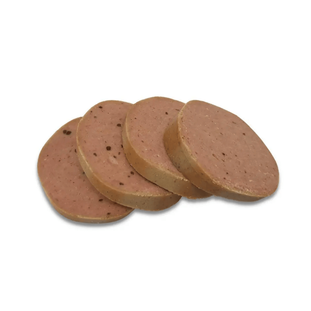 Four slices of chicken pate on a white background