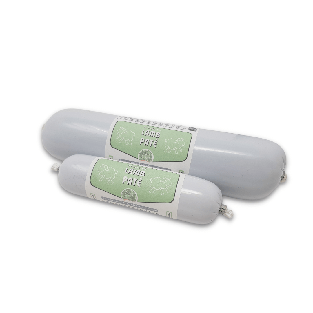 Two cylindrical containers labeled 'Lamb Pate' on a white background