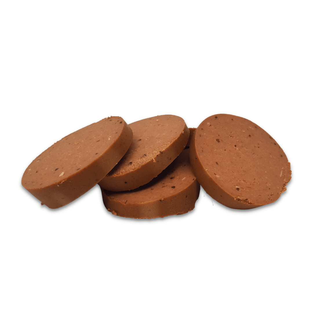 Slices of Salmon Paté against a white background