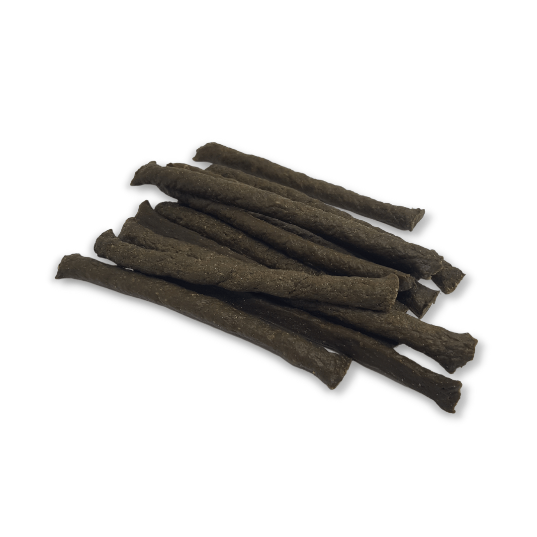 A pile of seabass twigs against a white background