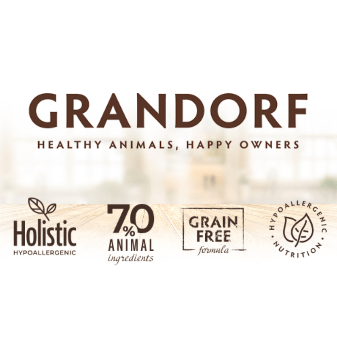 Grandorf pet food brand logo with product features on a blurred Kitchen background