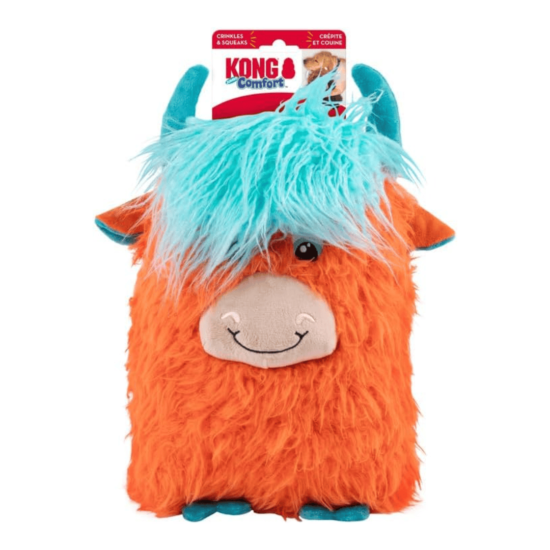 Orange Highland cow plush toy with blue hair on a white background, featuring KONG Comfort branding.