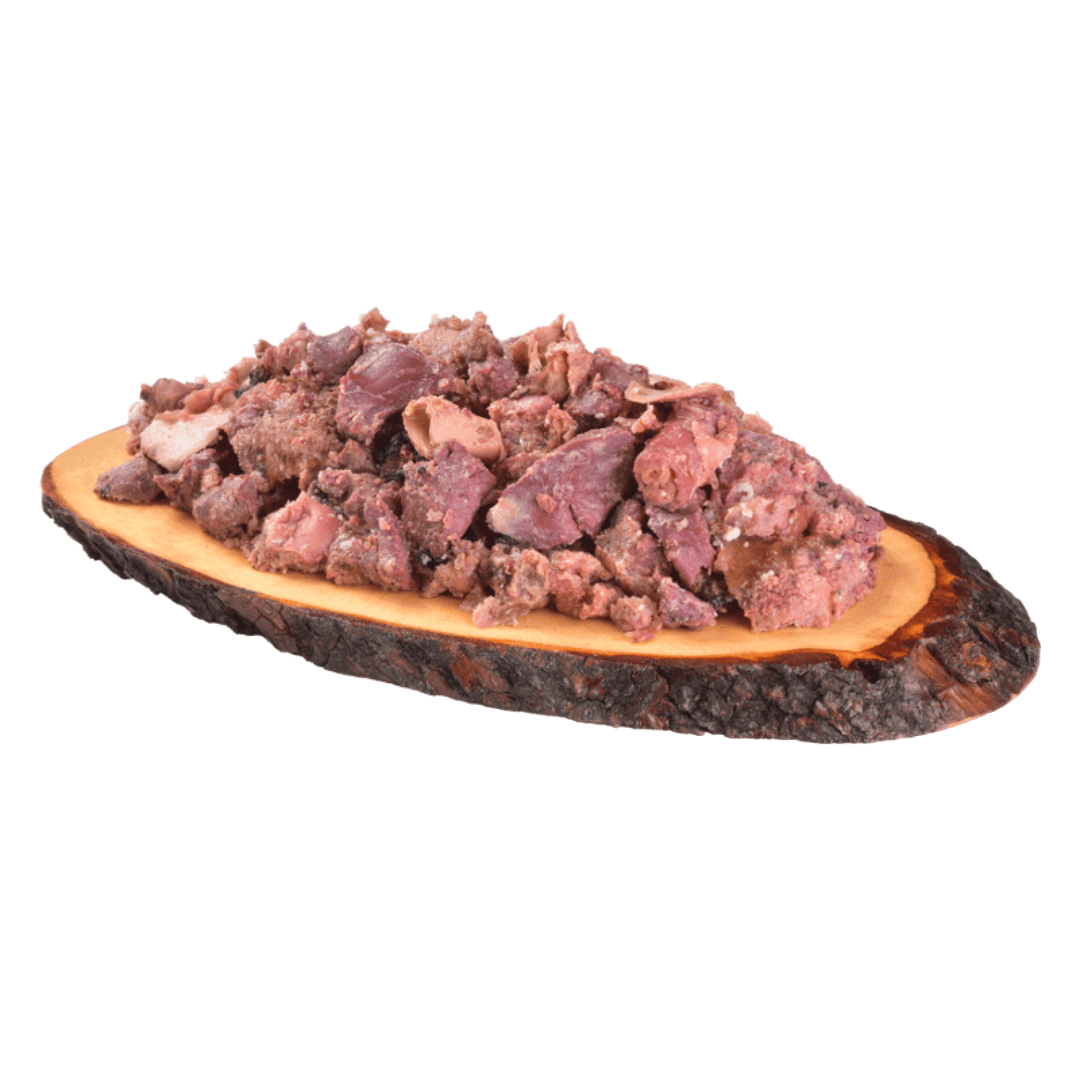 The Carnilove Lamb and Wild Boar wet dog food served on a wooden dish has a chunky consistency with many different textures throughout.