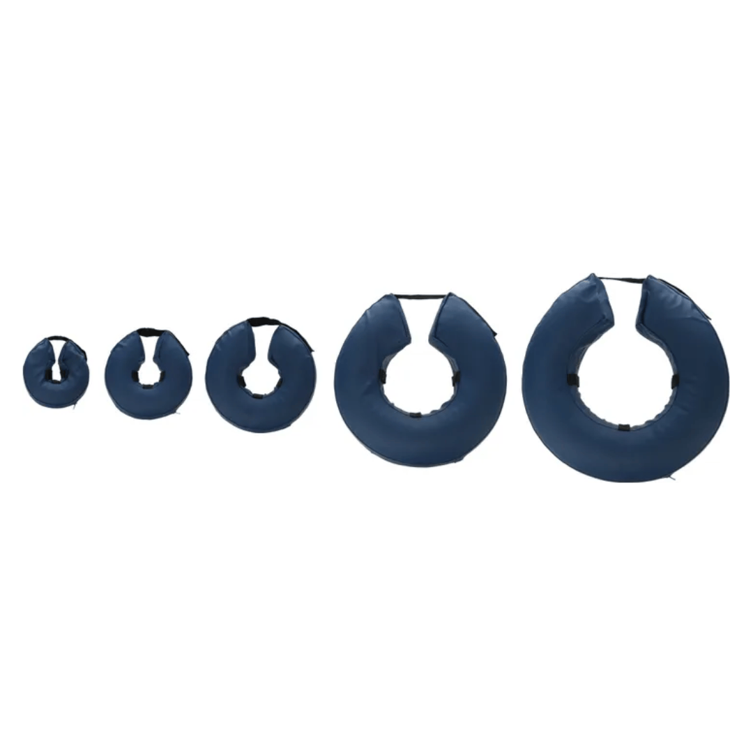 Set of five blue inflatable neck collars of different sizes on a white background