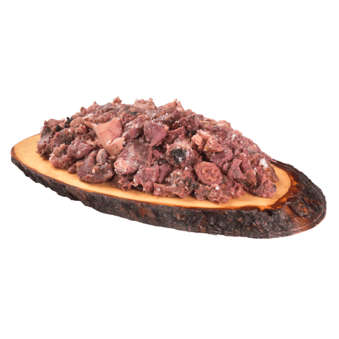 The Carnilove Venison & Reindeer wet dog food served on a wooden dish has a chunky consistency with many different textures throughout.