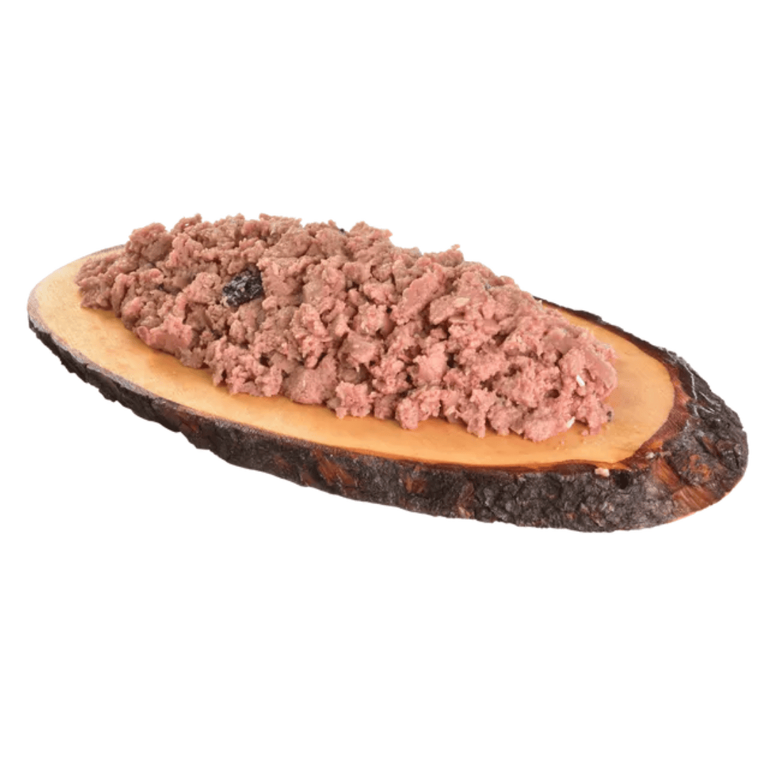 The Carnilove Salmon with Blueberries wet dog food served on a wooden slate. it is a mince like texture.