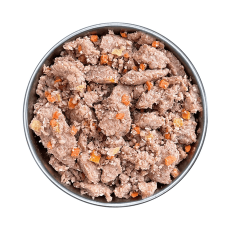 Fidelis pork menu in a metal bowl. Pieces of pork meat and vegetables.