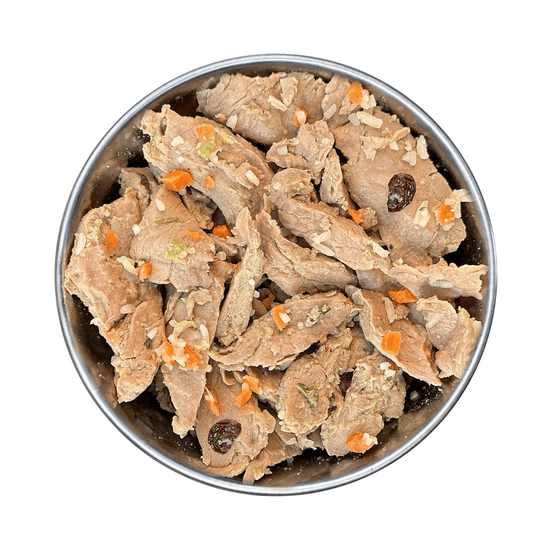 Fidelis Cooked Rabbit menu in a metal bowl. Chunky pieces of meat, fruit & veg.