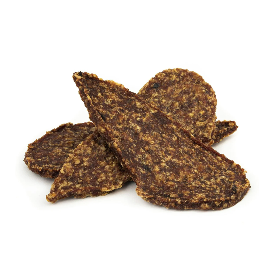 A pile of three Sana air dried turkey, sweet potato and pomegranate fillet treats for dogs.
