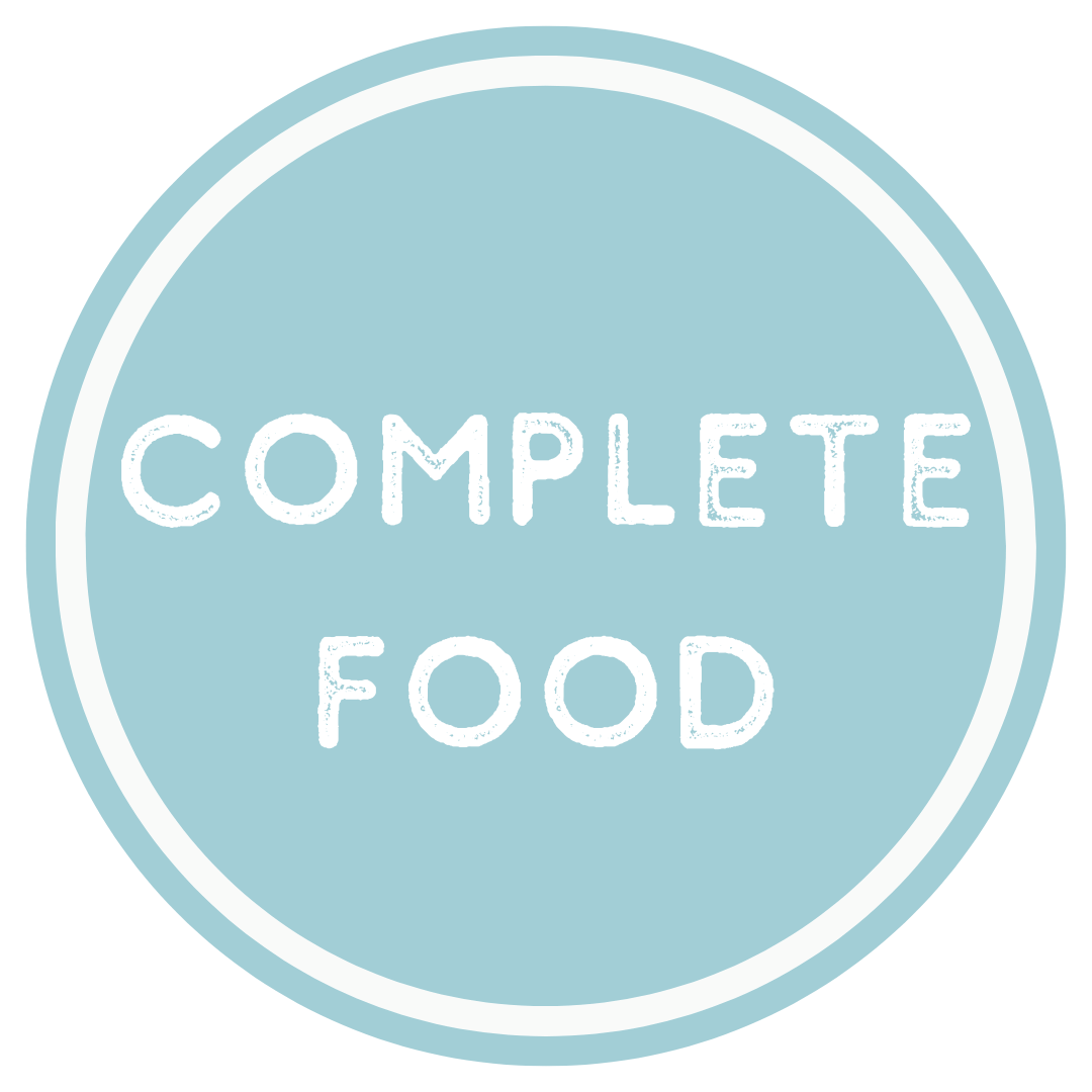 Round blue badge with 'COMPLETE FOOD' text on a white background