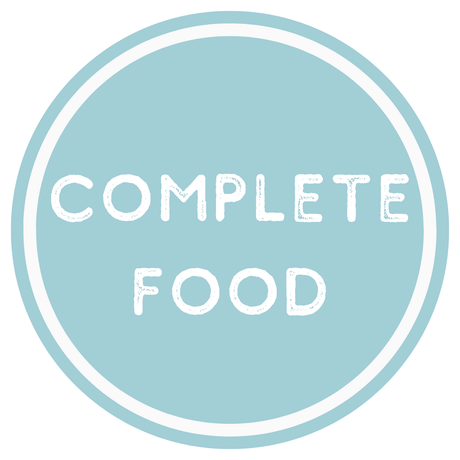 Round blue badge with 'COMPLETE FOOD' text on a white background