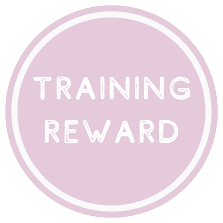 Circular badge with 'TRAINING REWARD' text on a light purple background