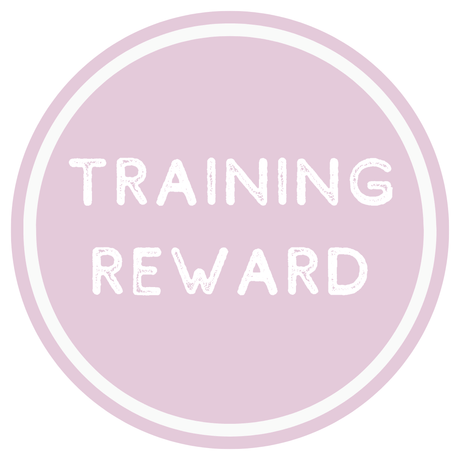 Circular badge with 'TRAINING REWARD' text on a light purple background