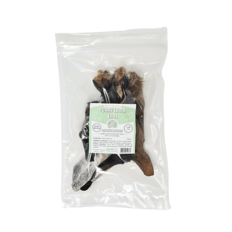 Packaged furry lamb ears dog chew product with a label on a white background