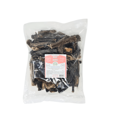 Bag of beef bark treats with a label on a white background