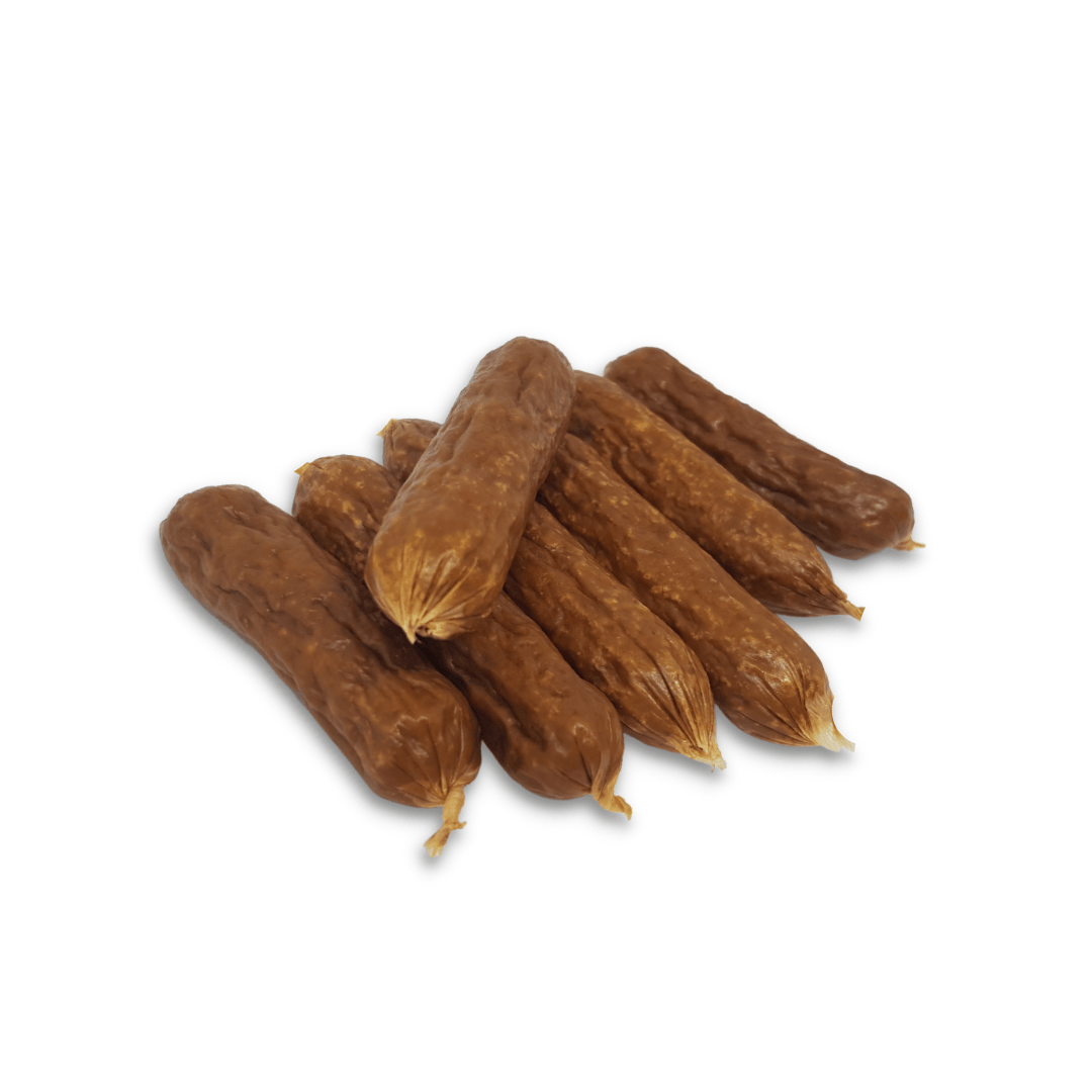 Chicken Bangers a dried chicken treat, are on a white background.