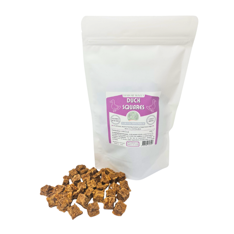 Bag of duck squares pet treats with a visible label on a white background