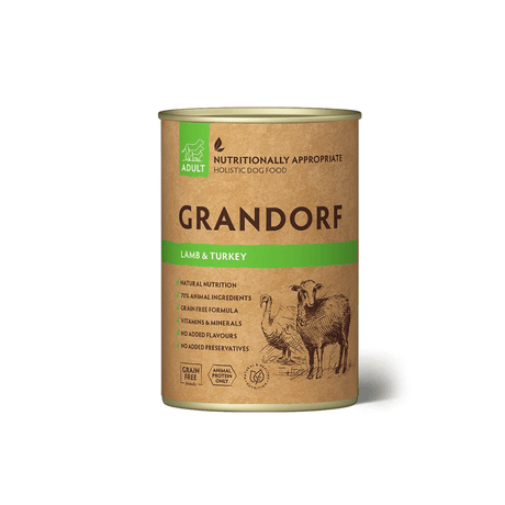 A can of Grandorf Adult Lamb & Turkey dog food on a clean white background. The can has a kraft brown label with green accents and an illustration of a sheep.