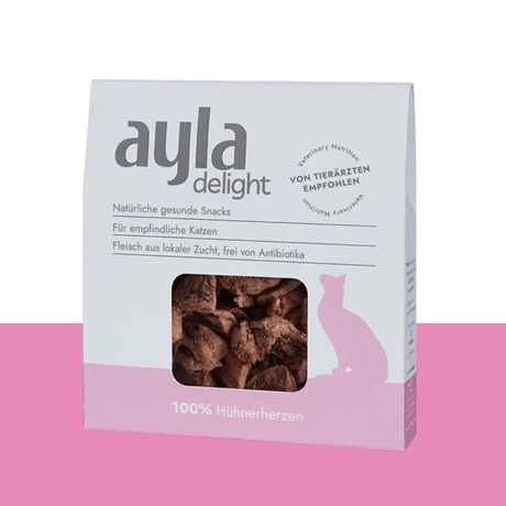 Box of ayla delight cat snacks on a pink background