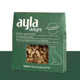 Green packaging of ayla delight cat snacks with a window showing the product.
