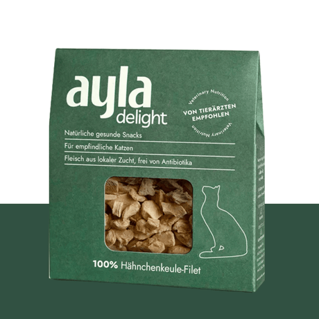 Green packaging of ayla delight cat snacks with a window showing the product.
