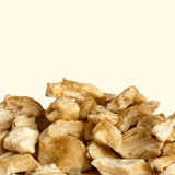 Close-up of dried chicken breast on a white background