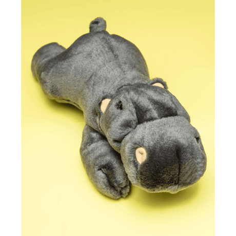 Helga Hippo grey hippopotamus plush toy on a yellow background