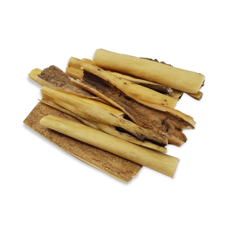 Venison chews on a white background