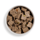 Forthglade Duck grain free wet dog food served in a bowl against a white background.